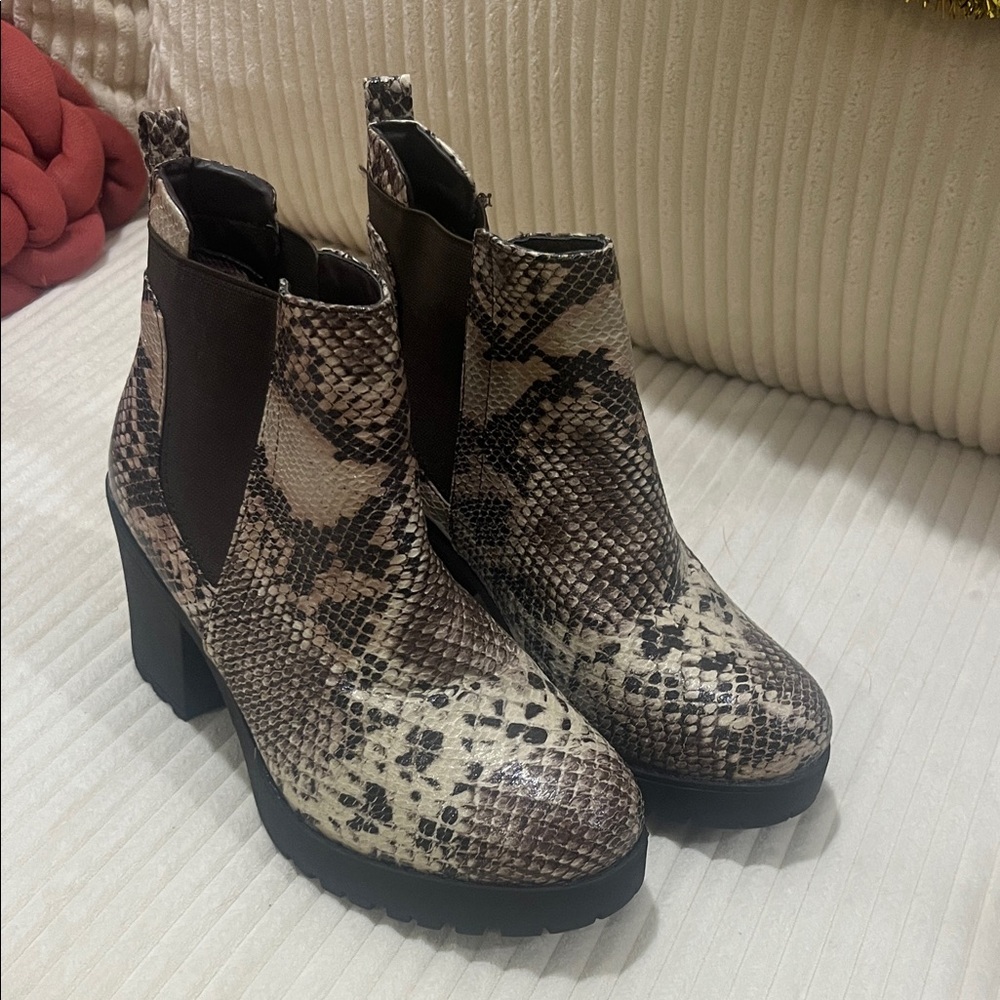 Elegant Snakeskin Heeled Boots